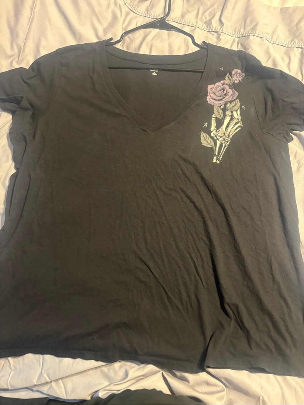 Torrid size 4 Black V-Neck Women’s Tee with Rose & Skeleton Hand Graphic